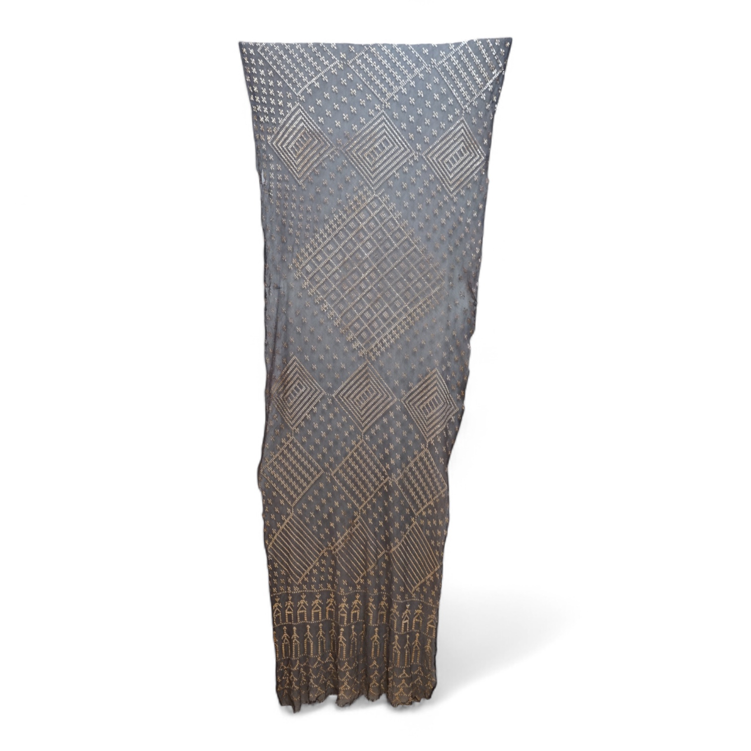 A 1930’s Egyptian decorative metal on black net evening stole. Approximately 218cm long. Condition - the rolled edges are frayed but the colour and design are intact.